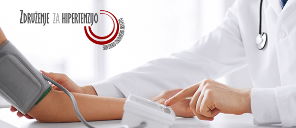 healthcare, hospital and medicine concept - doctor and patient measuring blood pressure